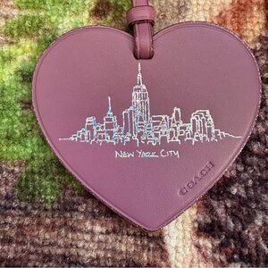 Coach Leather Heart Ornament in dusty rose with NYC skyline stamp